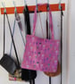 Tote bag handmade in a jellyfish theme on a pink background ideal for gifting