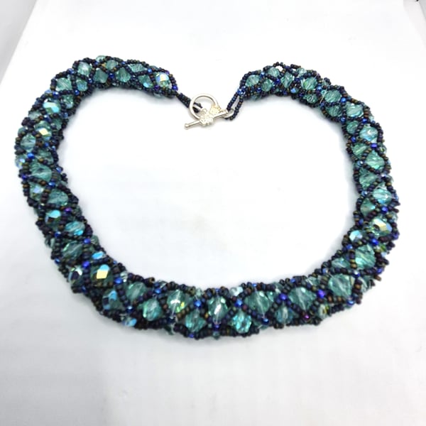 Swarovski crystal and seed bead netted necklace in blue colours