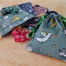 Draw string dice bag and gaming dice