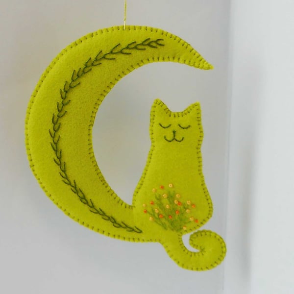 Lime green hanging ornament, embroidered crescent moon and cat 