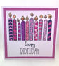 Purple and pink candles birthday card