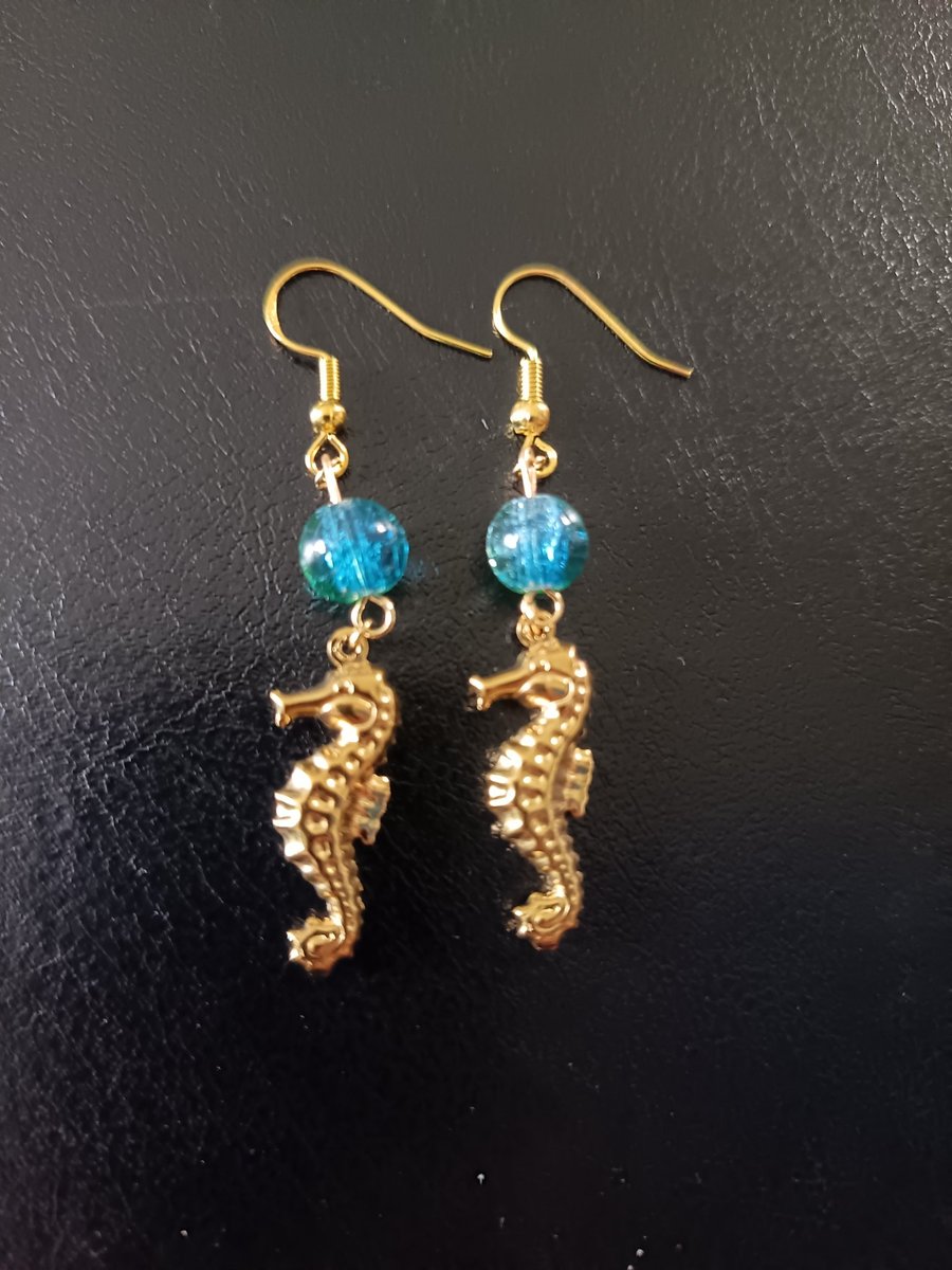 Gold stainless steel seahorse charm dangle earrings with blue beads 