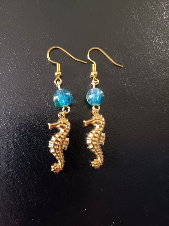 Gold stainless steel seahorse charm dangle earrings with blue beads 