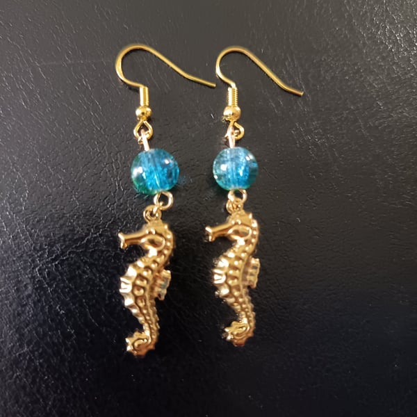 Gold stainless steel seahorse charm dangle earrings with blue beads 