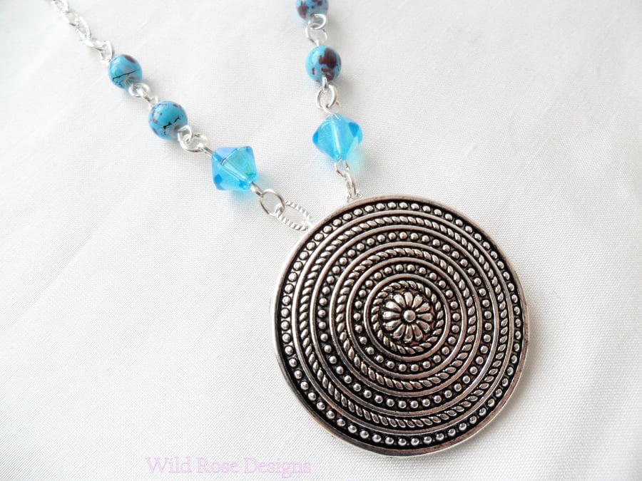 Turquoise and silver pendant necklace 