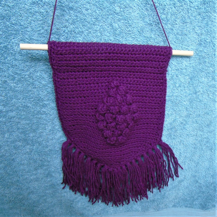 Crochet wall hanging with tassels - plum