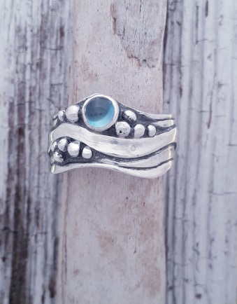 Broad Wave ring with Blue Topaz  L-T