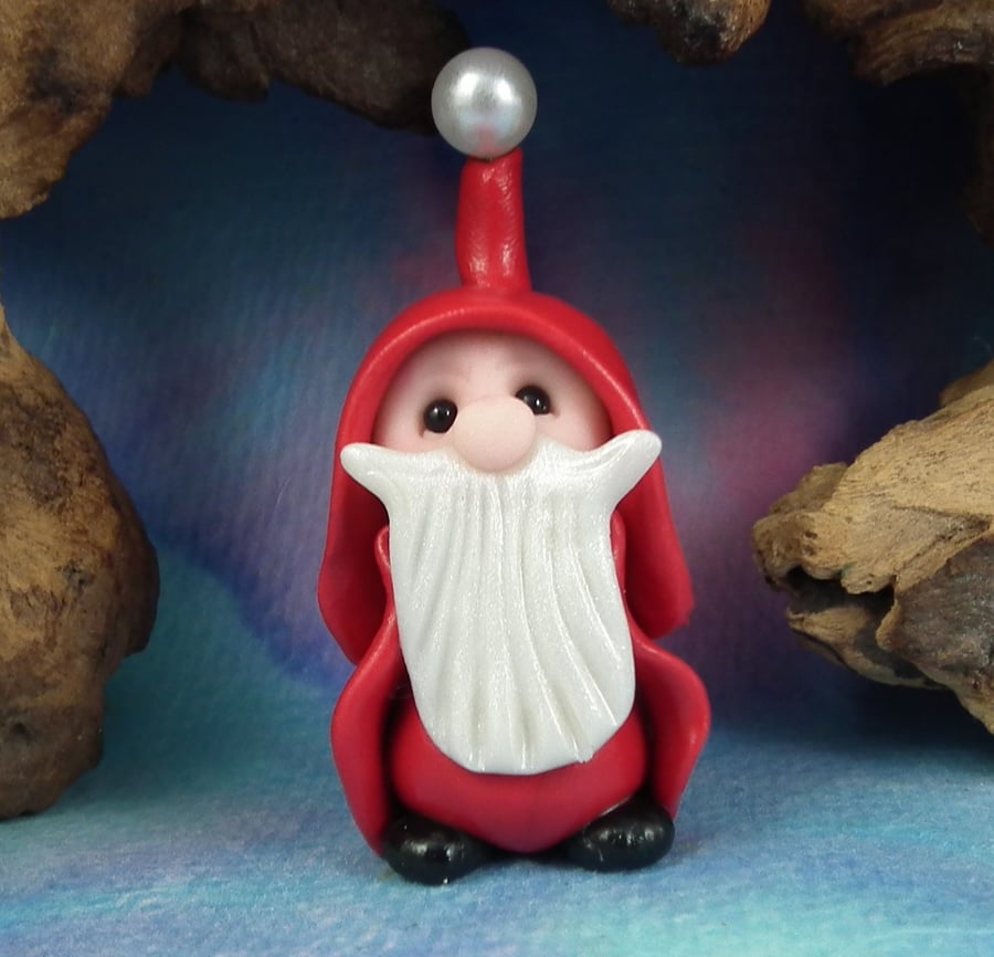 Gnome 'Nicholas' hiding in plain sight Undercover Santa by Ann Galvin