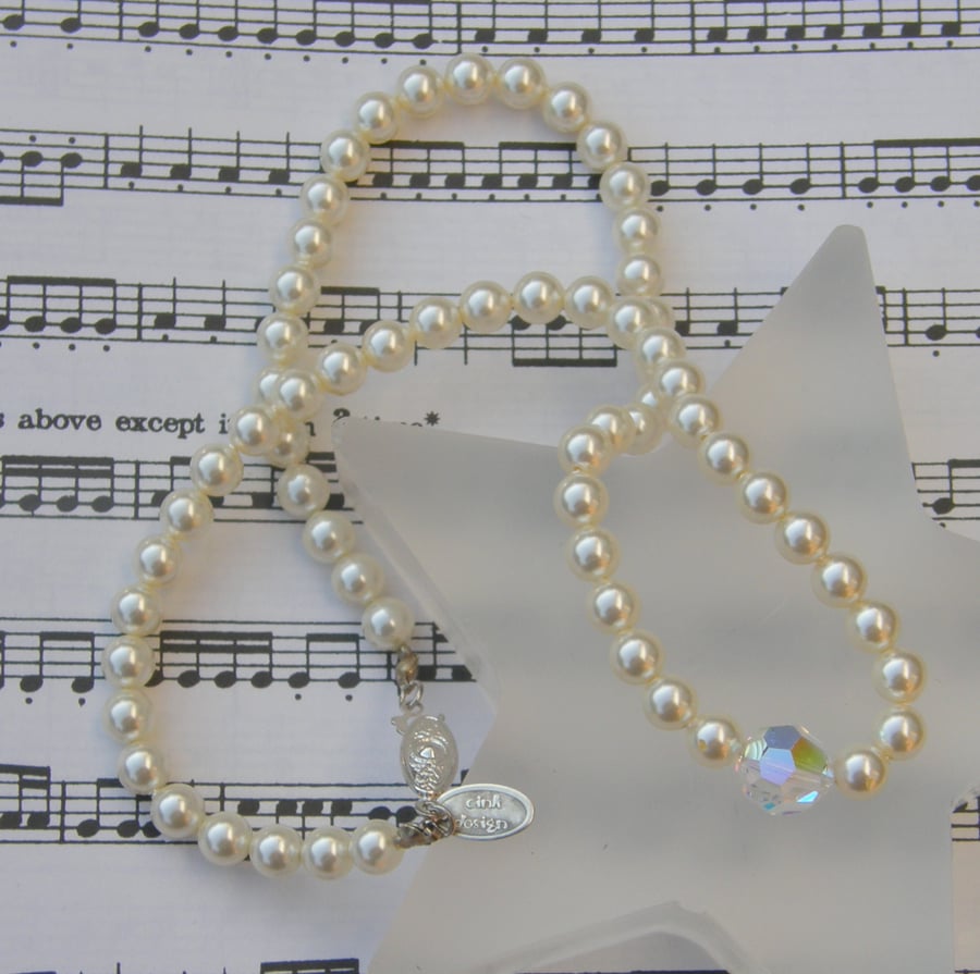 Swarovski clear AB crystal and ivory pearl necklace.