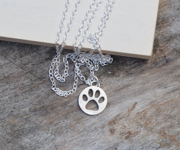 Hollow Pawprint Necklace In Sterling Silver