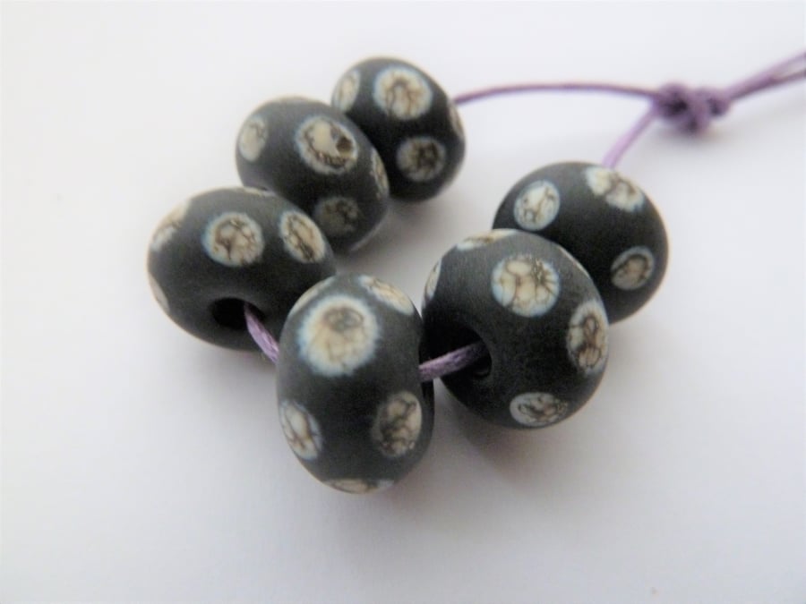black and ivory spot lampwork glass beads