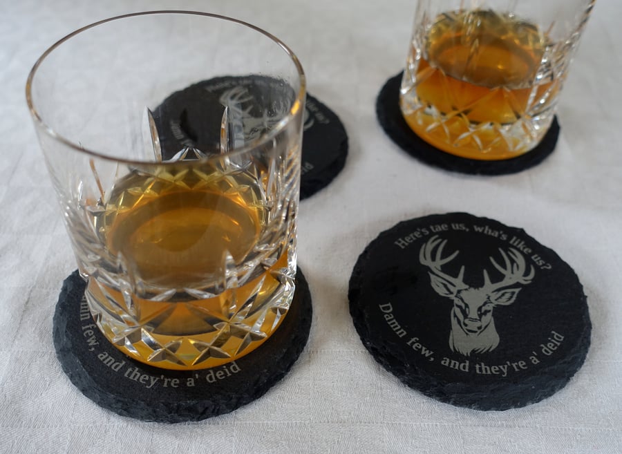 Set of 4 natural slate coasters. Engraved with the image of a stag.