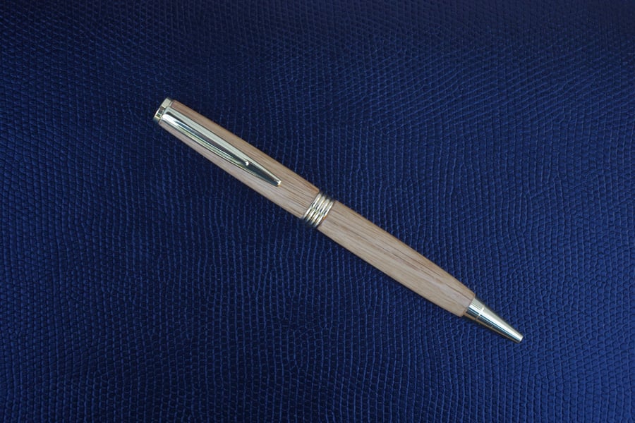 Oak whisky barrel handmade pen. Chrome plated.