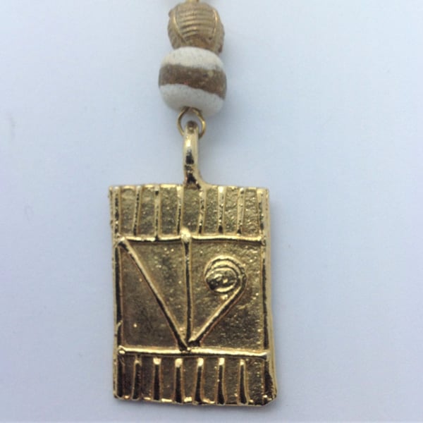 Key ring with handmade African recycled brass pendant and bead
