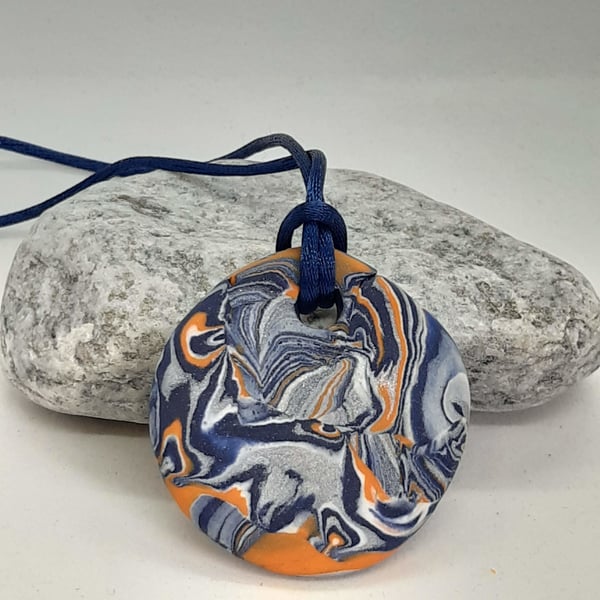 Round polymer clay pendant