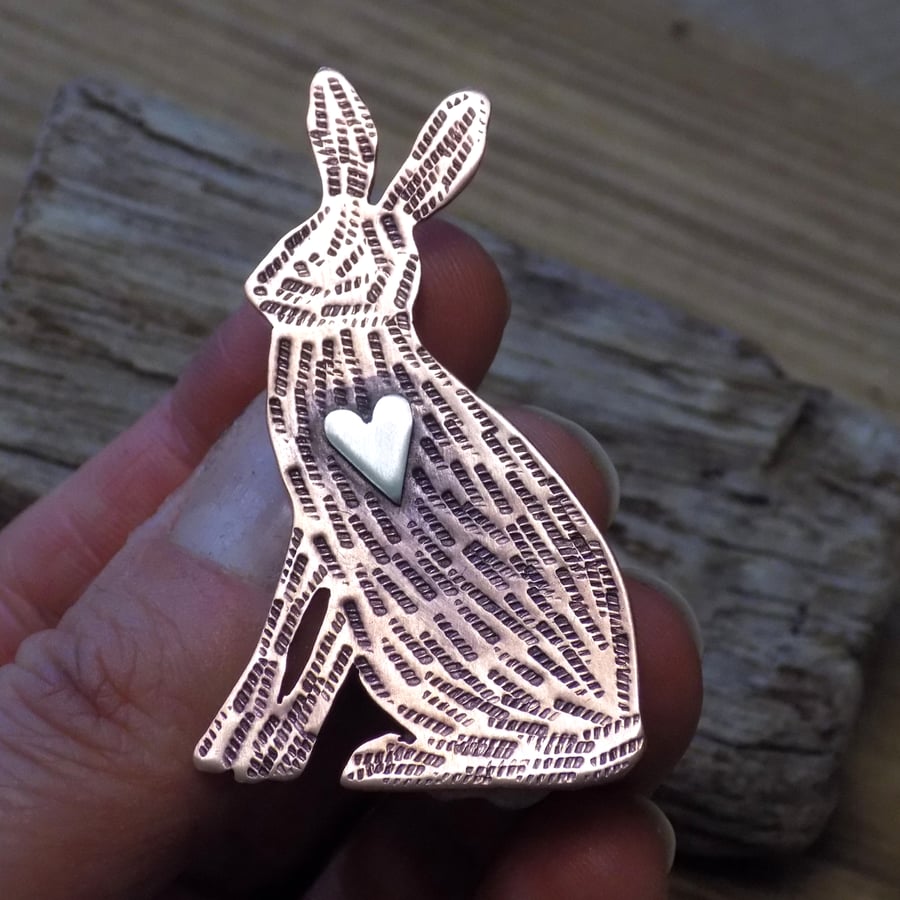 Copper and silver brown hare mixed metals brooch