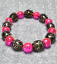 Black Glass Decorated Barrel and Bright Pink Chunky Glass Bead Bracelet
