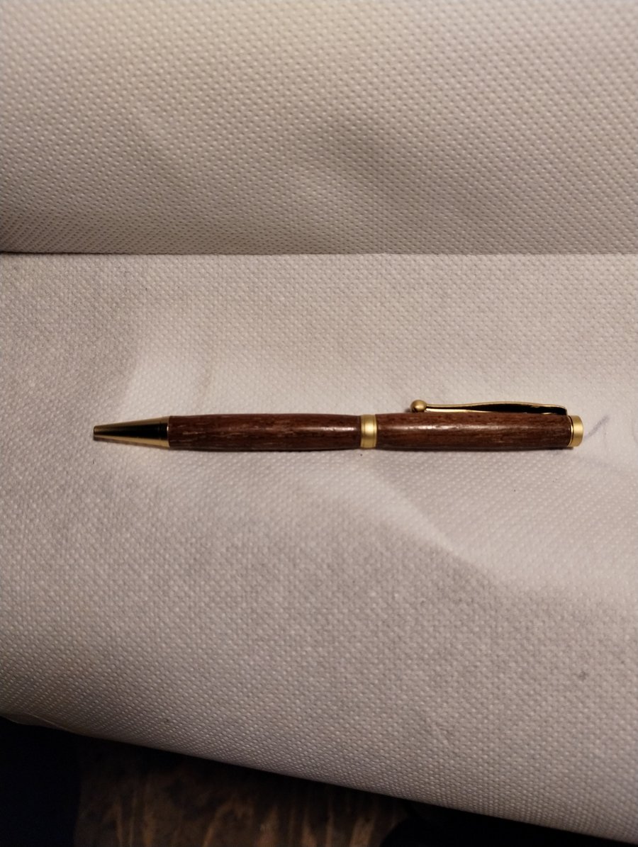 wooden pen with ballpoint