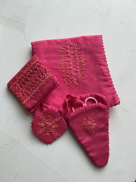 Needlecase, scissor case, scissor fob in a silk pouch.
