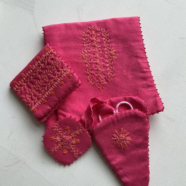 Needlecase, scissor case, scissor fob in a silk pouch.