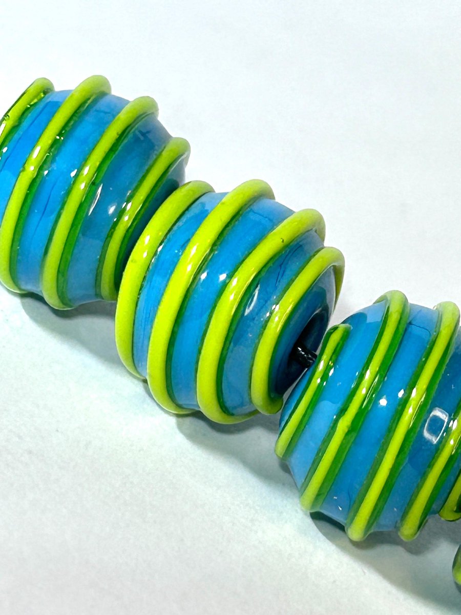 Handmade turquoise and yellow lamp work glass beads