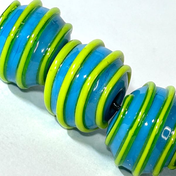 Handmade turquoise and yellow lamp work glass beads