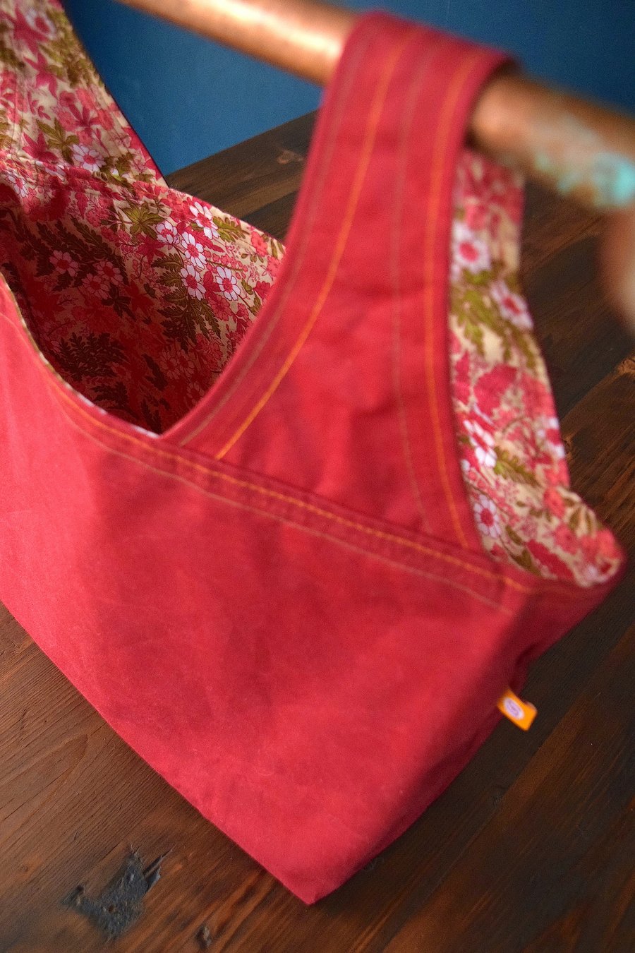 shopping bag – red waxed cotton with pink floral interior