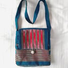 Shoulder bag.  Kingfisher, turquoise, dark red woven fabric