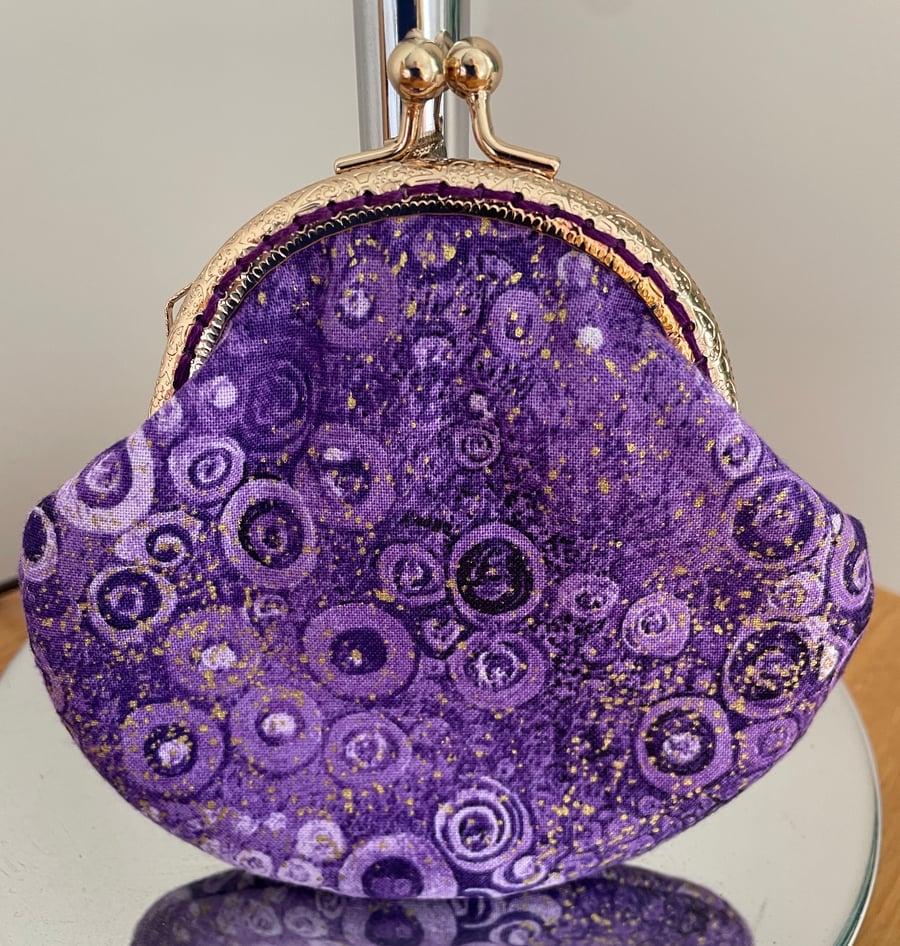 Clasp Coin Purse in a Purple & Gold Cotton Fabric.