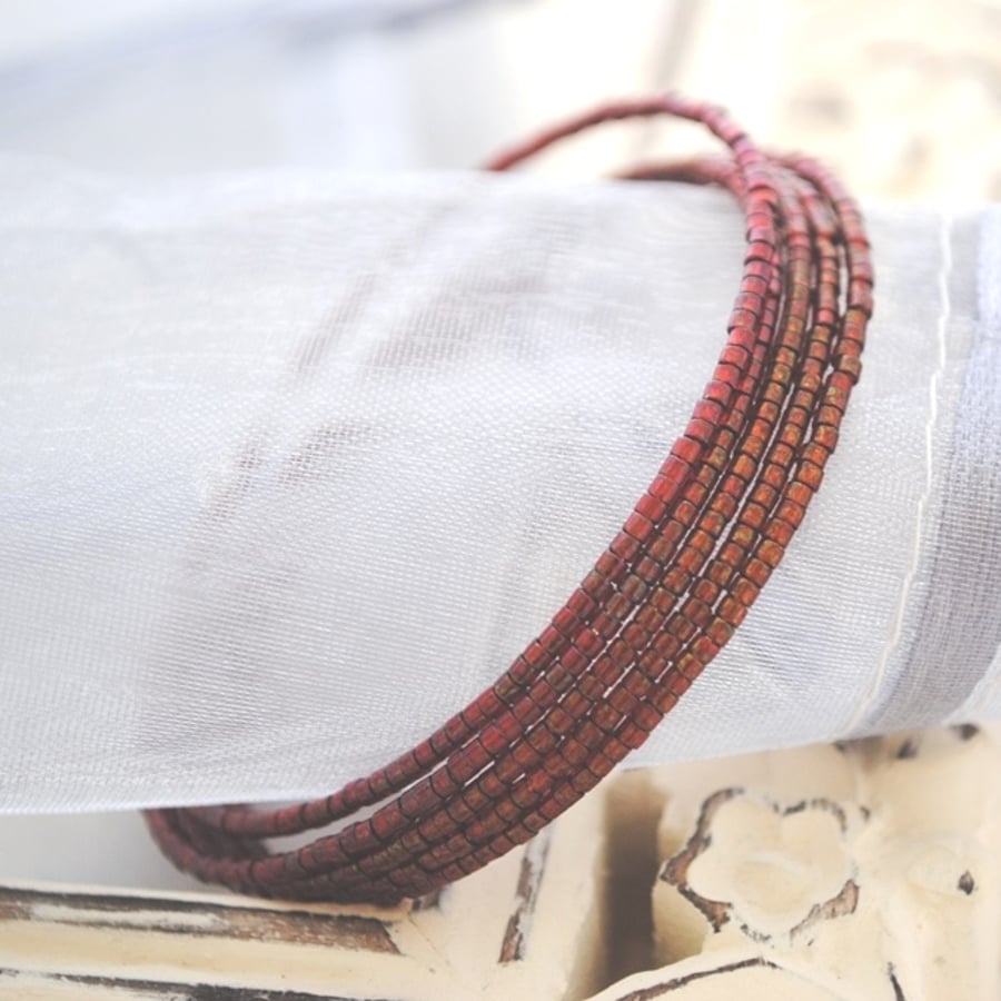Red seed wrap (memory wire) Bracelet