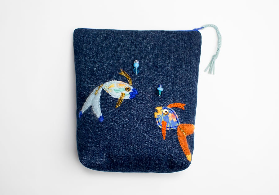 Blue denim make up bag with hand embroidered fish