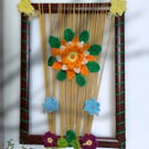 wood frame with crochet flowers