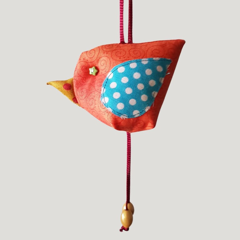 Orange Hanging Fabric Bird Ornament with Turquoise Polka Dot Wing