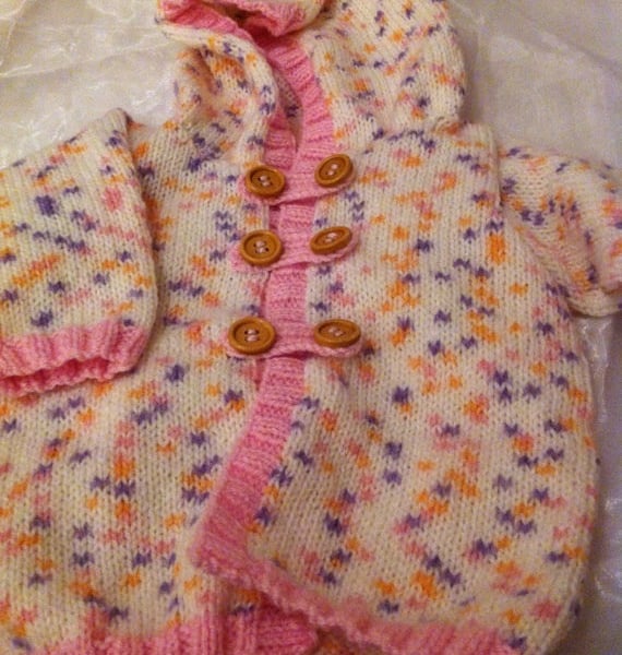 Pink spotted knitted hooded baby cardigan