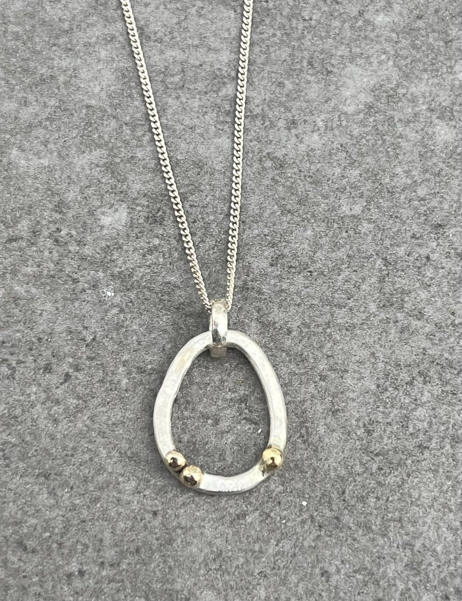 Ebb & Flow Pebble Pendant, silver and gold pendant, pebble pendant, oval 