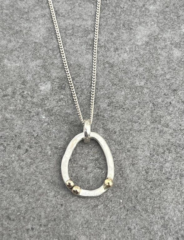 Ebb & Flow Pebble Pendant, silver and gold pendant, pebble pendant, oval 