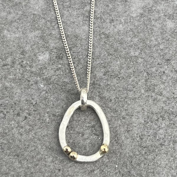 Ebb & Flow Pebble Pendant, silver and gold pendant, pebble pendant, oval 