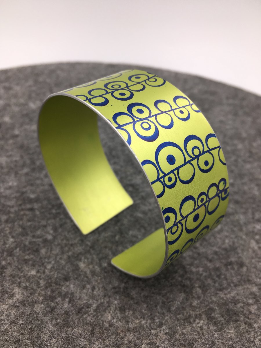 Lime green and blue anodised aluminium seed head cuff