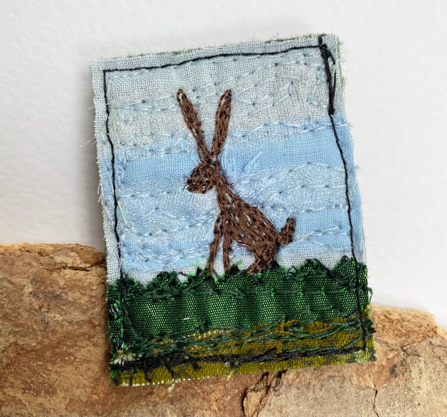 Upcycled hare brooch pin or badge. 