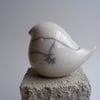 Raku glazed round bird