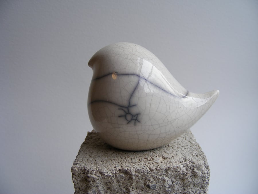 Raku glazed round bird
