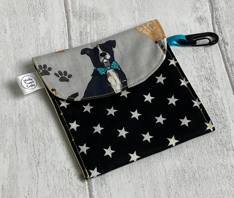 Dog treat bag with small carabiner clip. Black stars.