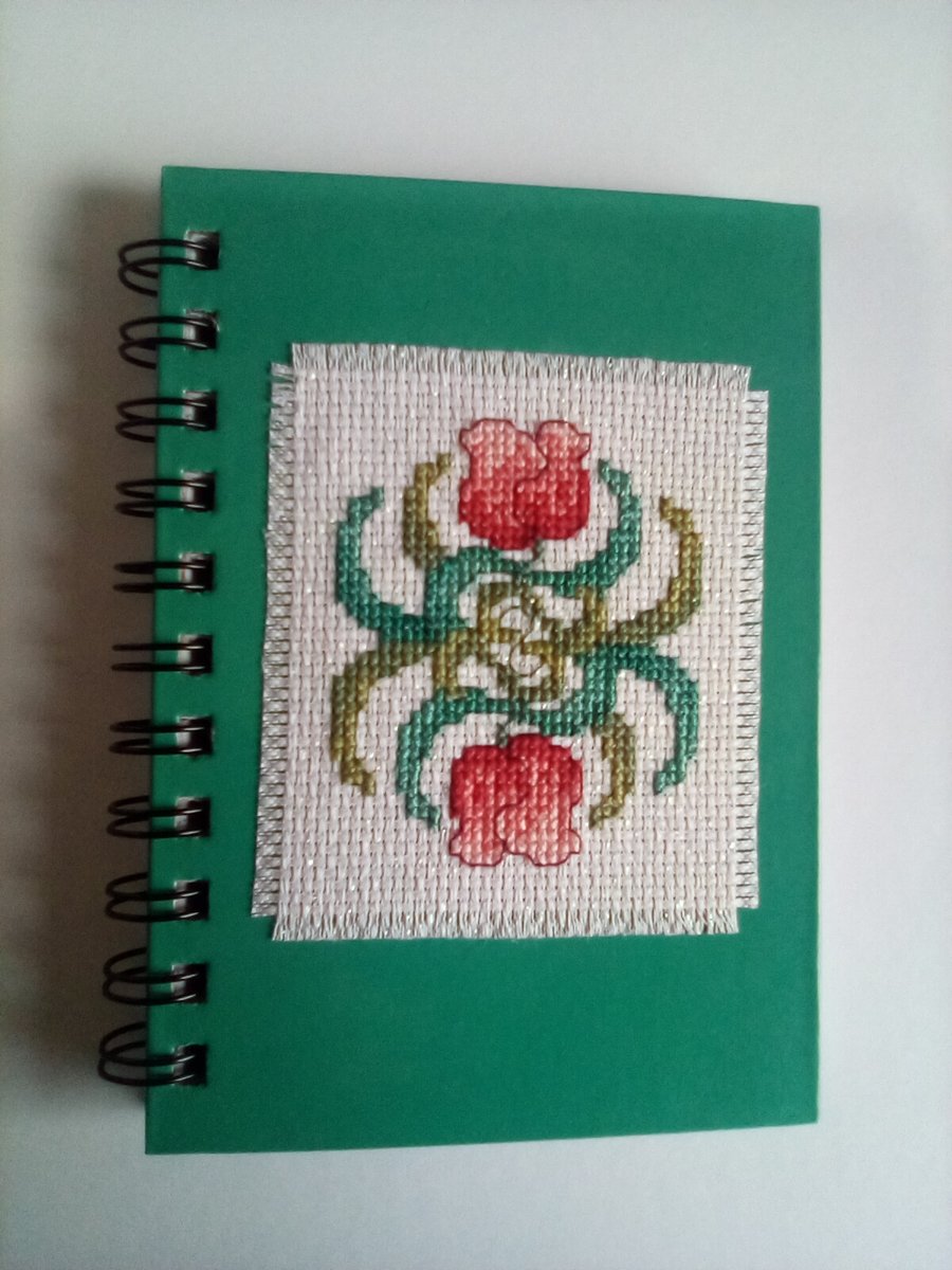 Beautiful hand stitched cross stitch spiral bound ruled floral notebook.