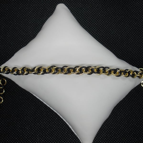 Black and gold twist braclet