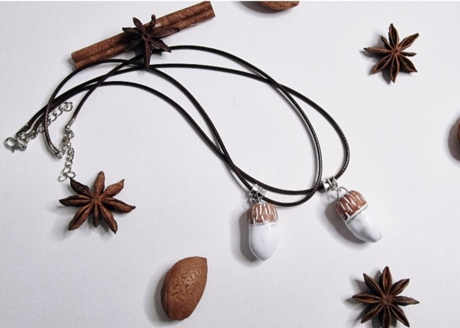 Ceramic Acorn Pendants with necklace cord. Sold individually.