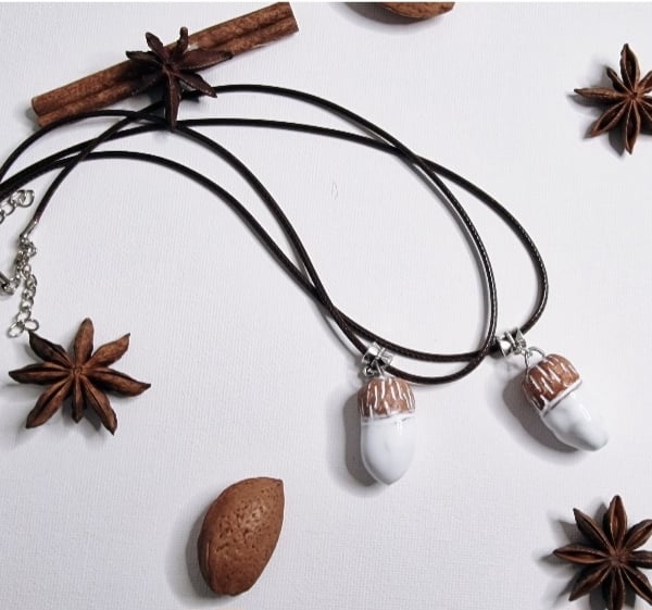 Ceramic Acorn Pendants with necklace cord. Sold individually.