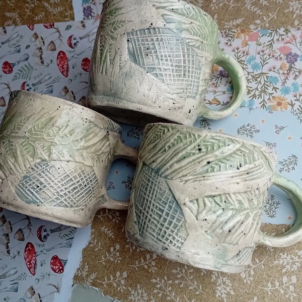 Small rustic mug,tea cup, linocut design fern leaf green blue speckle