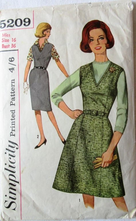 A vintage sewing pattern for a misses' pinafore dress in 2 styles and size 16