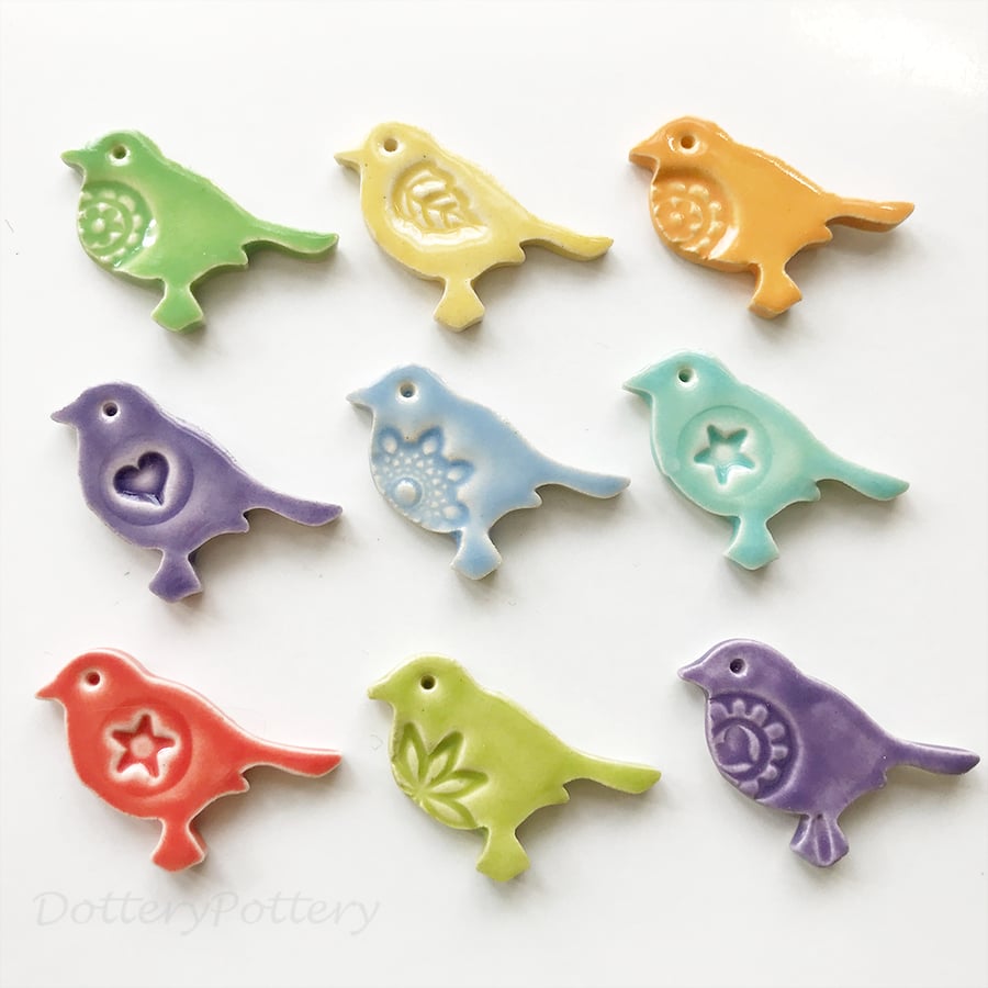 Set of nine tiny ceramic bird tiles