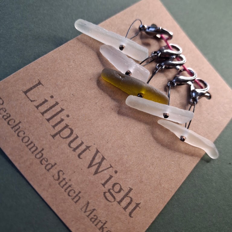 Five white sea glass stitch markers for crochet